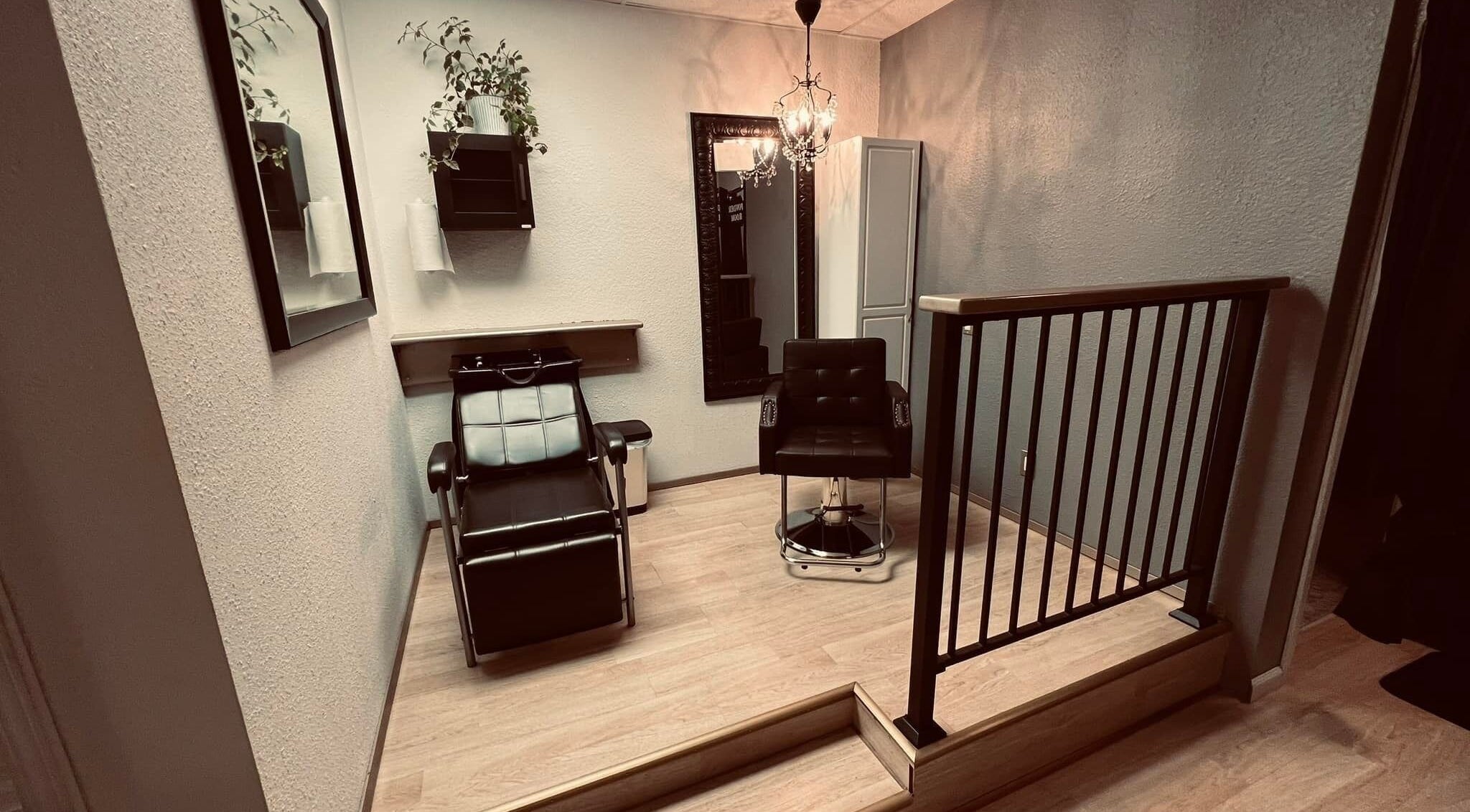 Elegant interior of Amore Lash Lounge in Auburn, California, US with stylish chairs and modern decor.