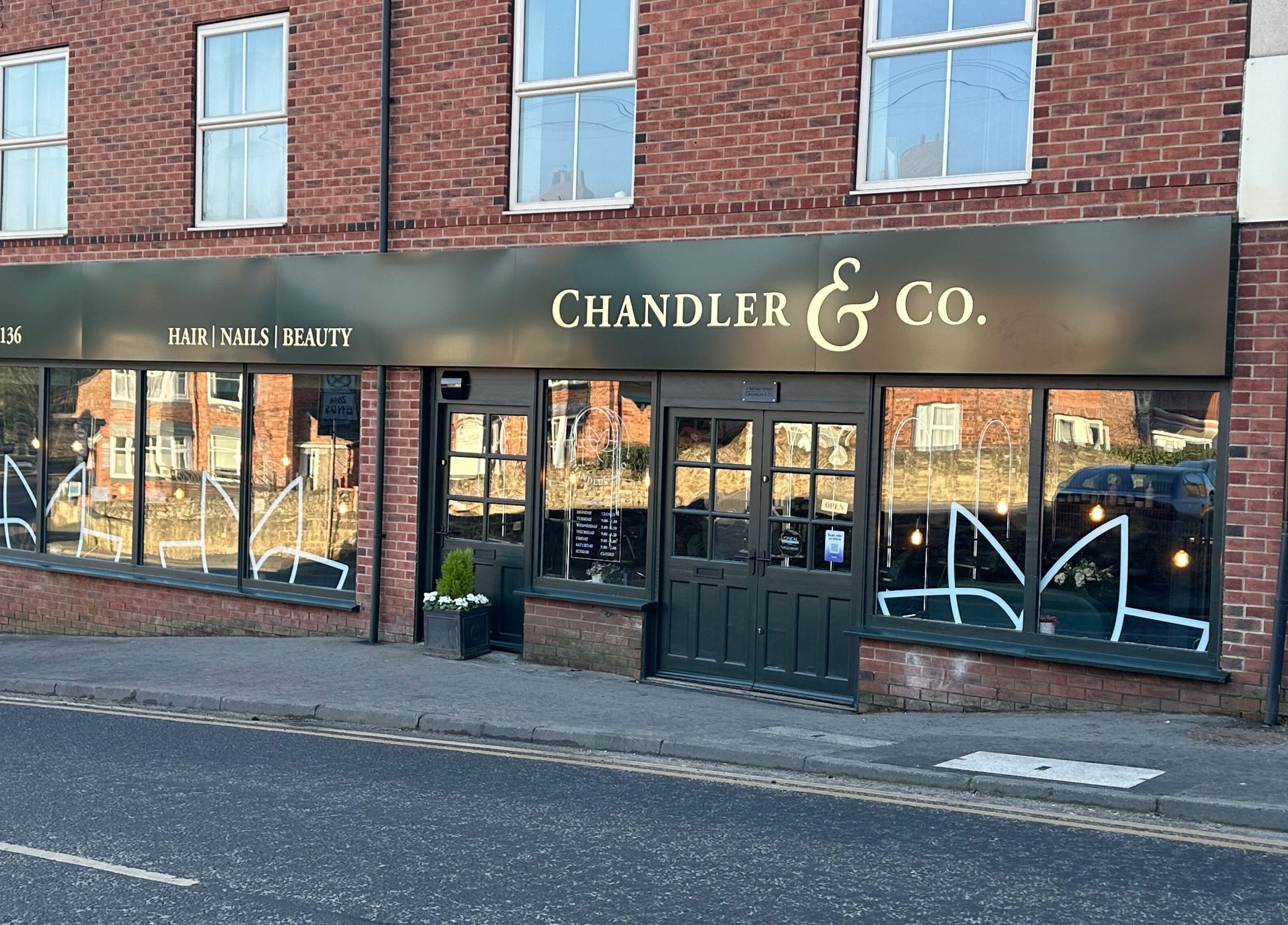 Exterior of Chandler and Co., a beauty salon in Bedale, England, GB, featuring its welcoming storefront.