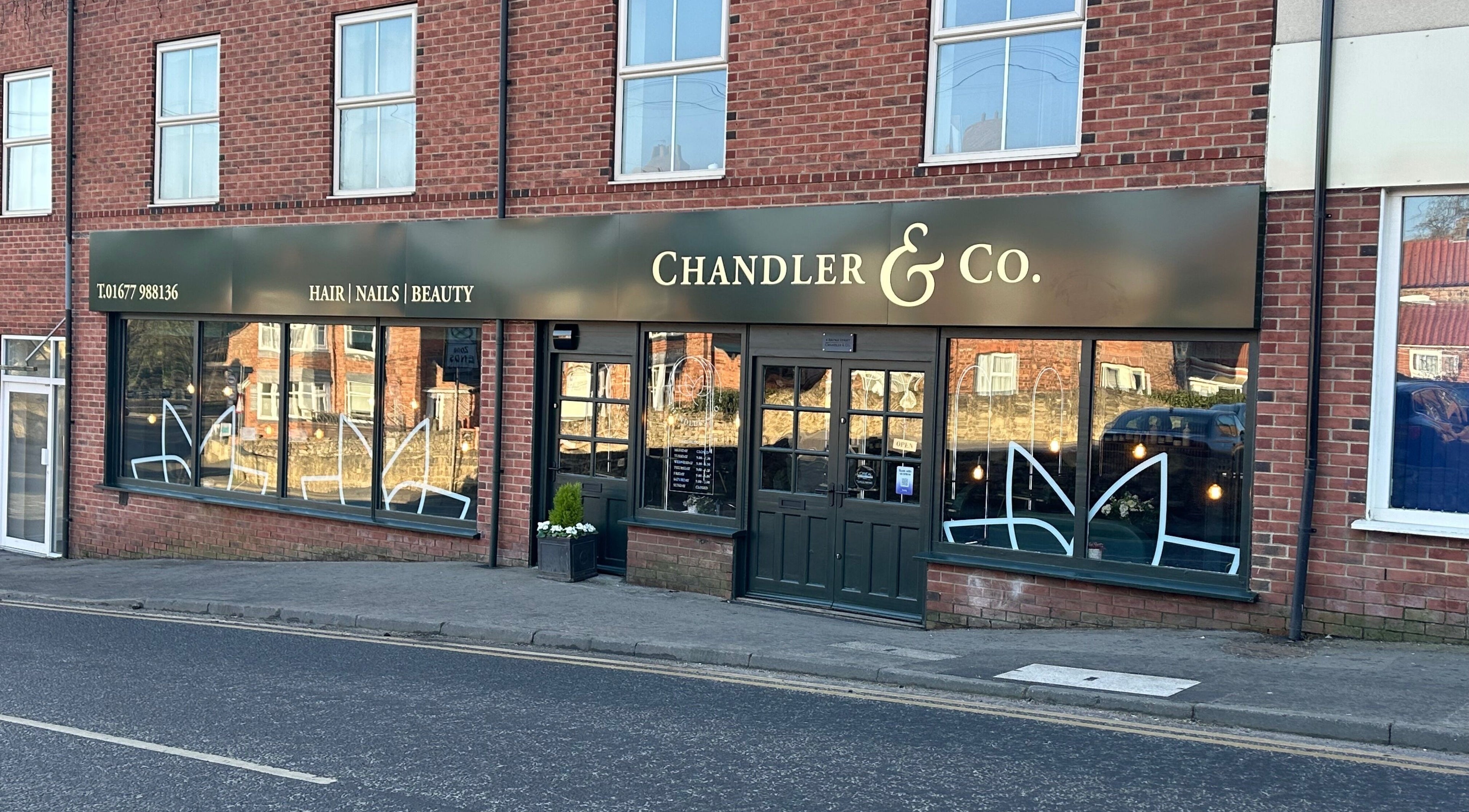 Exterior of Chandler and Co., a beauty salon in Bedale, England, GB, featuring its welcoming storefront.