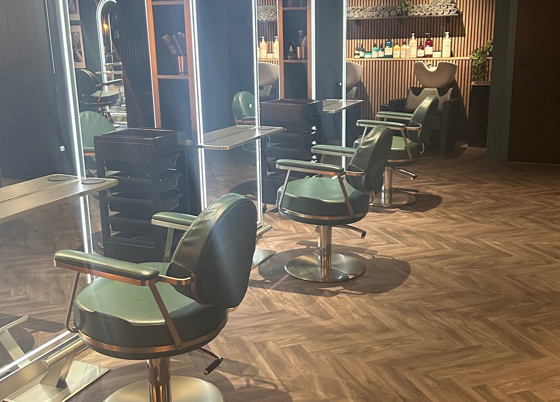 Comfortable salon chairs at Chandler and Co. in Bedale, England, GB, ready for beauty treatments.