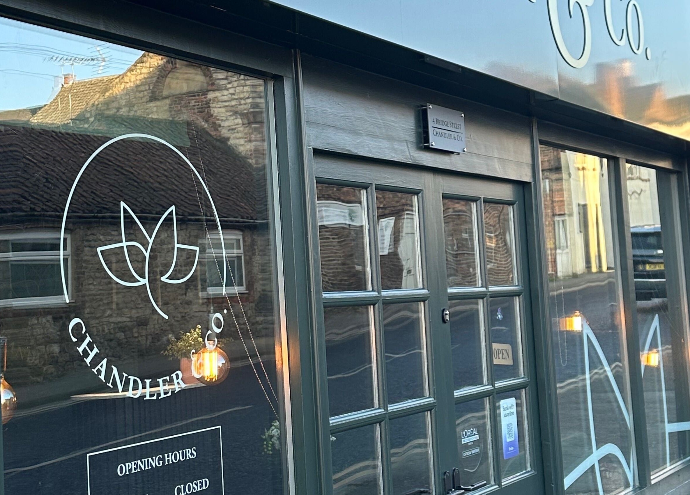 Front view of Chandler and Co. in Bedale, England, GB with signage and exterior decor.