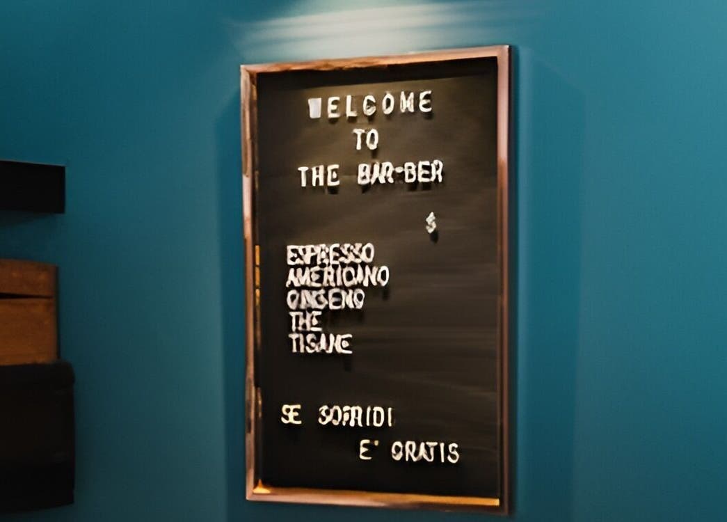 Lavagna di benvenuto a The BarBer, Martina Franca, Puglia, IT con offerte di caffè.