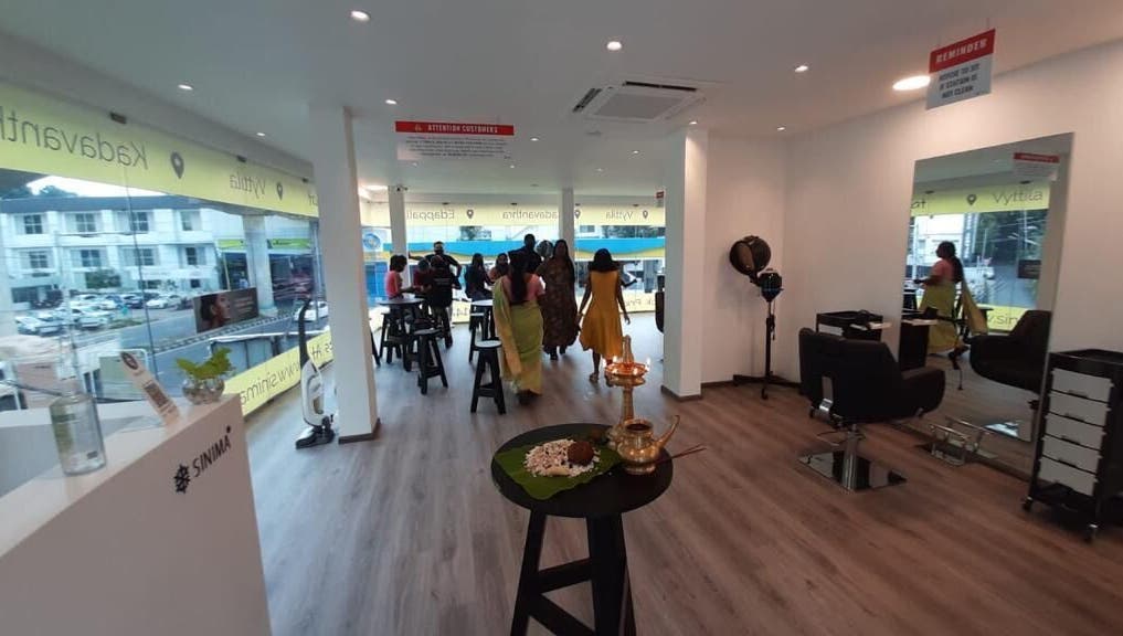 SINIMA Salon - Edappally's elegant interior in Kochi, Kerala, IN, showcasing modern decor and a welcoming ambiance.