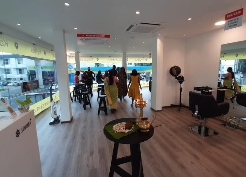 SINIMA Salon - Edappally's elegant interior in Kochi, Kerala, IN, showcasing modern decor and a welcoming ambiance.