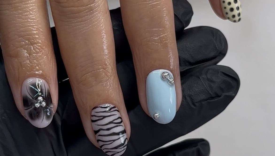 Detailed nail art showcasing creative designs at Rosé Nail House, Cape Town, Western Cape, ZA.