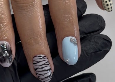 Detailed nail art showcasing creative designs at Rosé Nail House, Cape Town, Western Cape, ZA.