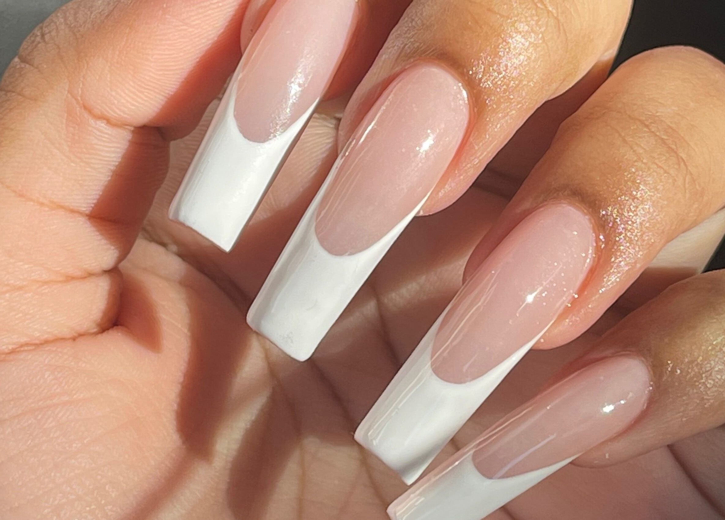 Beautiful French tips at Rosé Nail House, Cape Town, Western Cape, ZA, showcasing expert nail art.