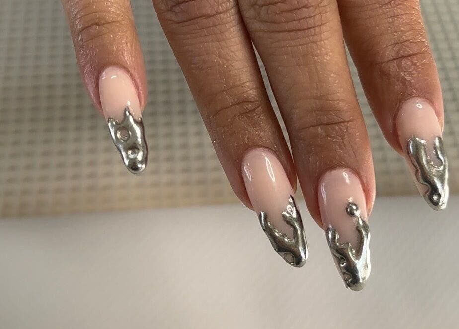 Stylish metallic nail art at Rosé Nail House, Cape Town, Western Cape, ZA, highlighting creative beauty.