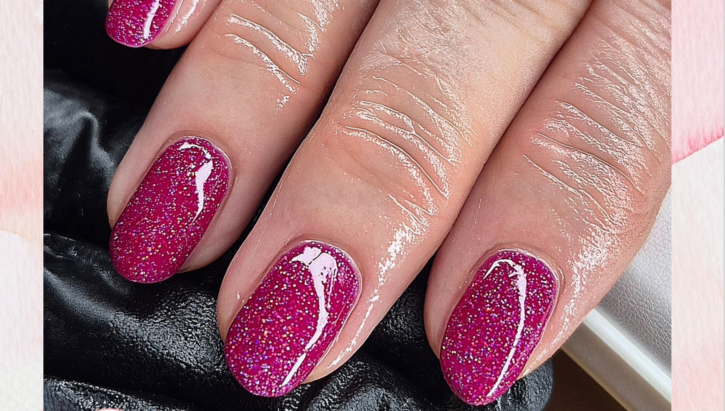 Sparkling pink glitter nails at Fi Fi's Beauty in Fareham, England, GB, showcasing expert nail artistry.