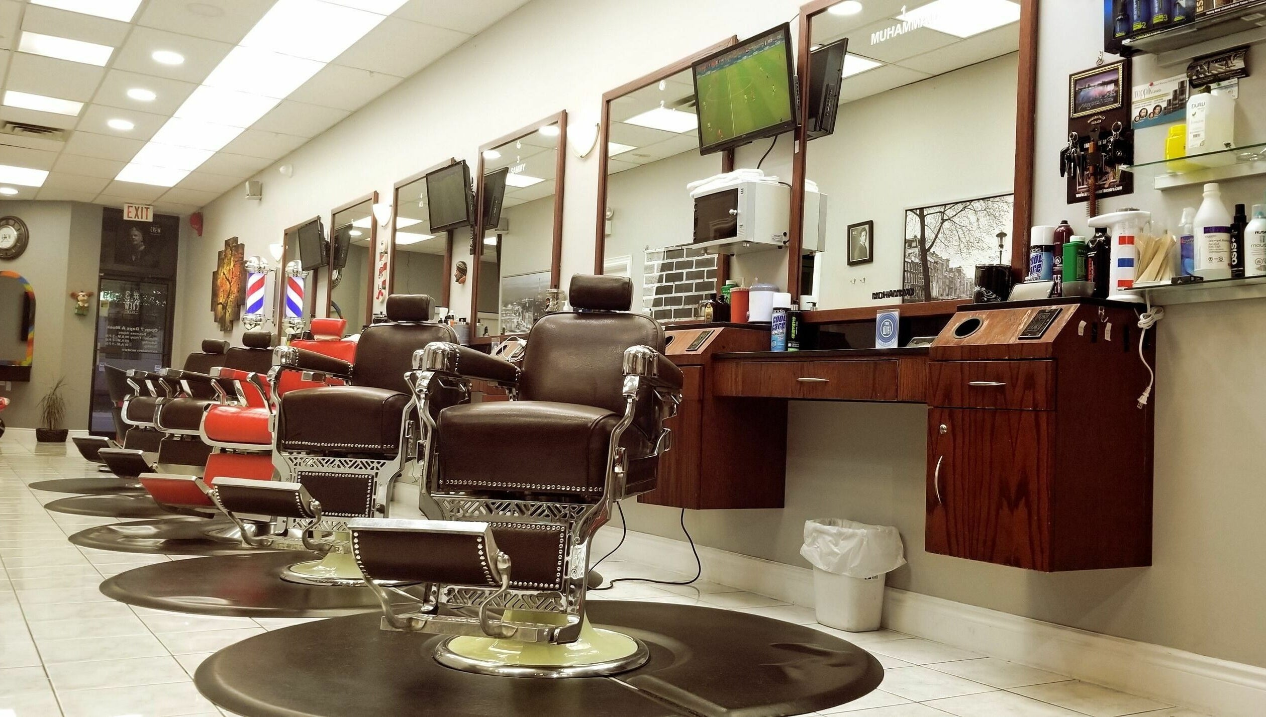 Adam's Barber Chair in Mississauga, Ontario, CA. Elegant barber chairs and mirrors in a welcoming setting.