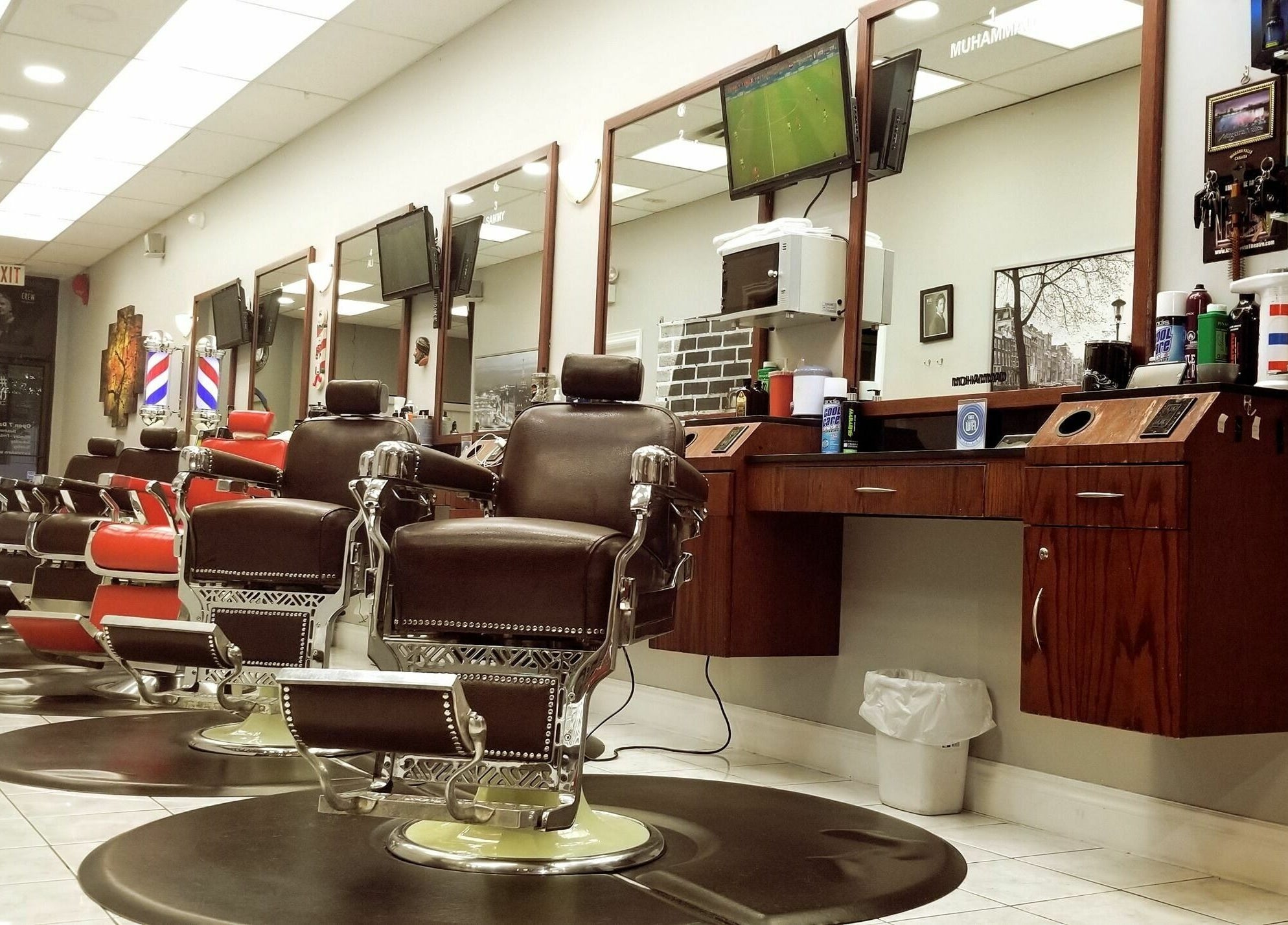 Adam's Barber Chair in Mississauga, Ontario, CA. Elegant barber chairs and mirrors in a welcoming setting.