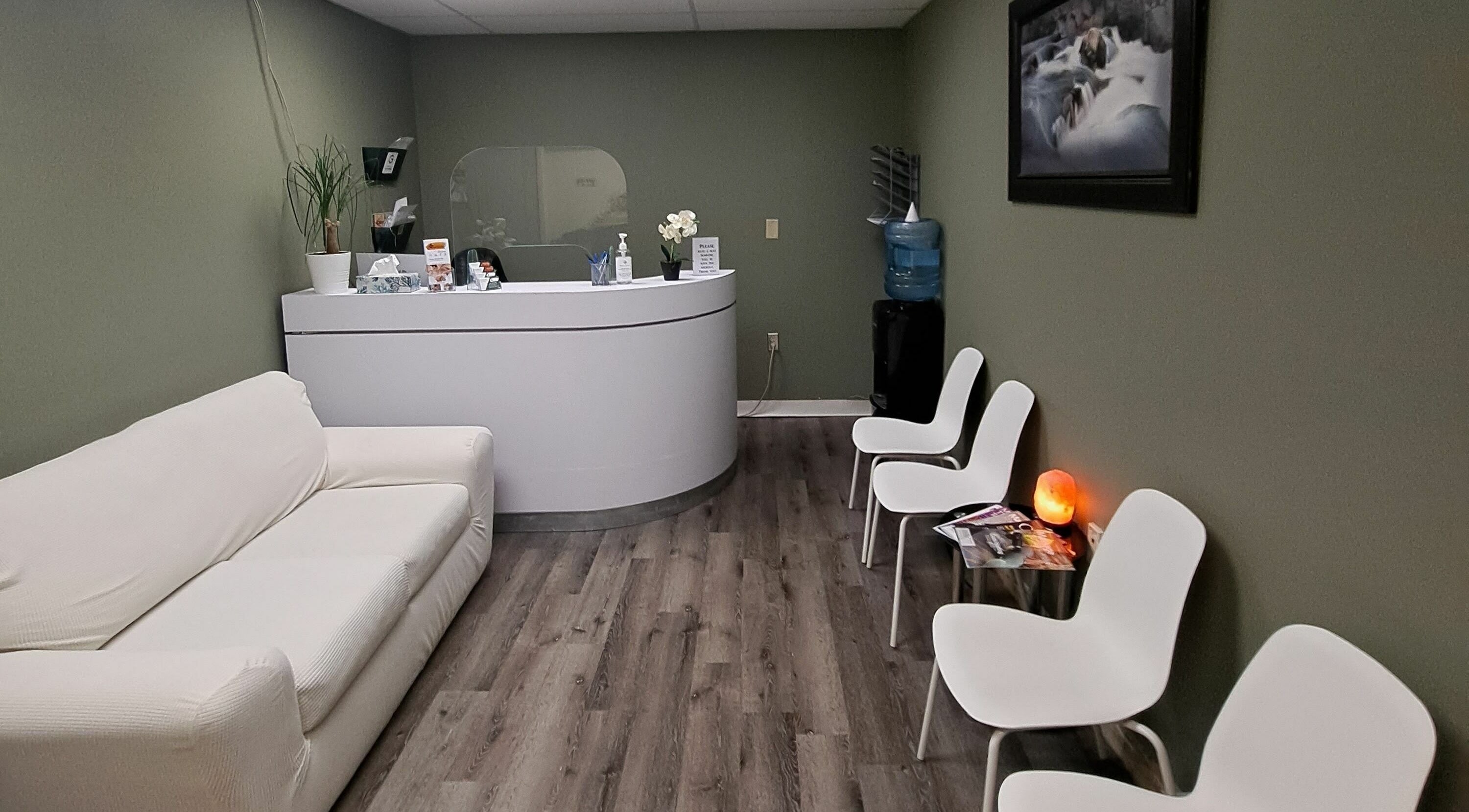 Inviting reception area at Holistic Healing 4 Life, Dartmouth, Nova Scotia, CA with a serene, modern design.