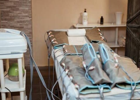 Relaxing treatment room at Holistic Healing 4 Life, Dartmouth, Nova Scotia, CA, featuring advanced wellness equipment.