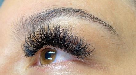 Detailed close-up of expertly applied eyelash extensions at Glamour Queen Artistry Inc., Coquitlam, British Columbia, CA.