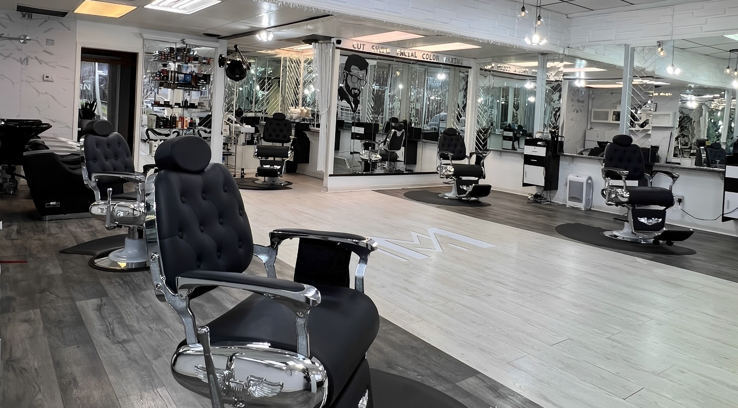 Modern Man South End offers sleek barber chairs in Charlotte, North Carolina, US, showcasing style and comfort.