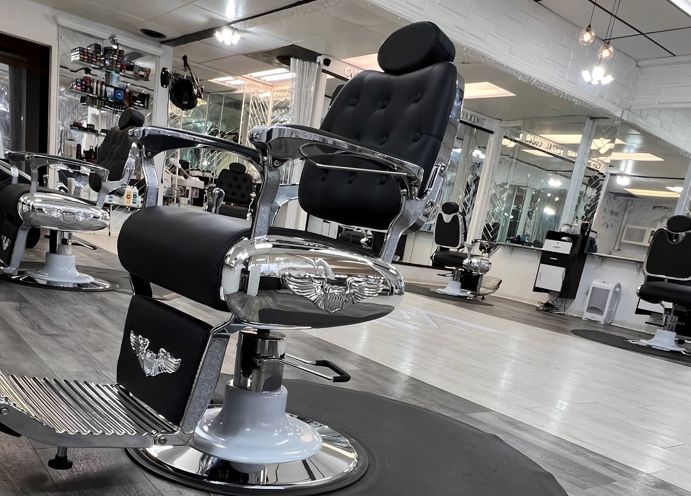 Modern Man South End’s sleek barber chairs in Charlotte, North Carolina, US, featuring stylish, modern design.