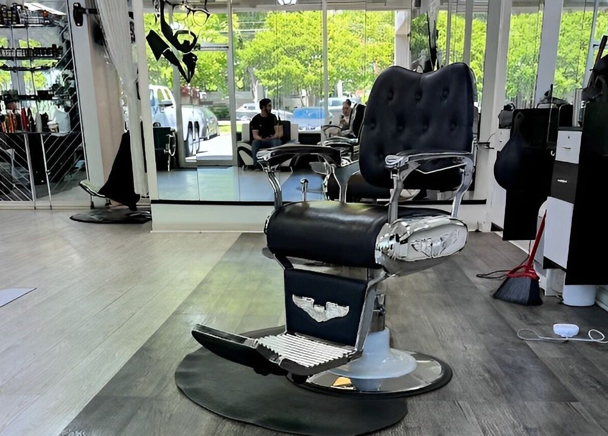 Elegant barber chair at Modern Man South End, Charlotte, North Carolina, US, highlighting a stylish interior.