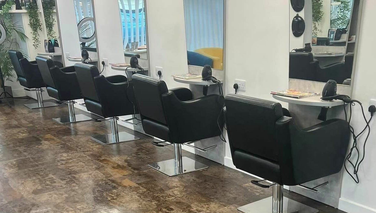 Modern salon chairs at Macie's, Guernsey, Castel, GG providing a sleek and stylish setting for beauty treatments.