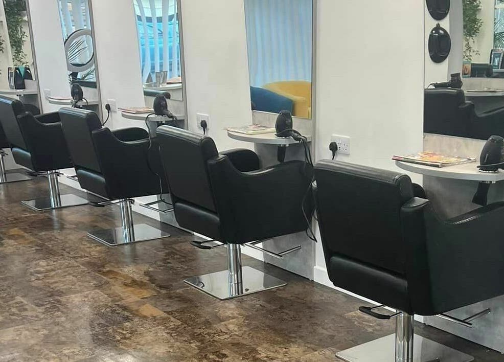 Modern salon chairs at Macie's, Guernsey, Castel, GG providing a sleek and stylish setting for beauty treatments.