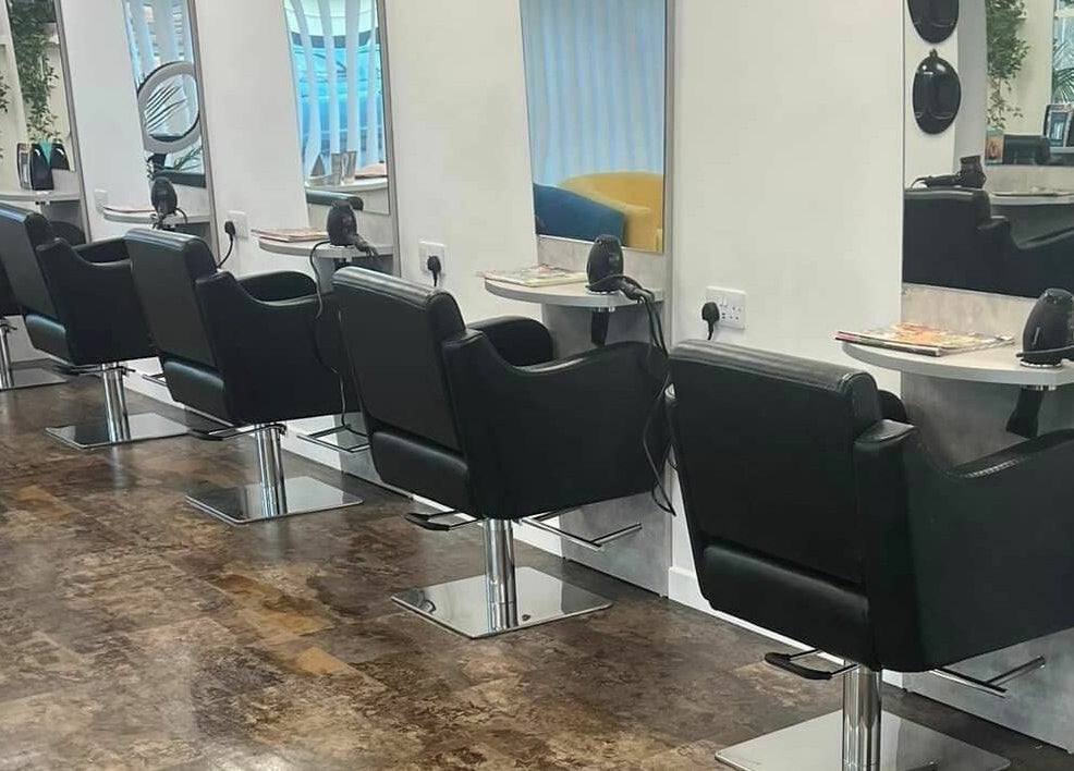 Modern salon chairs at Macie's, Guernsey, Castel, GG providing a sleek and stylish setting for beauty treatments.