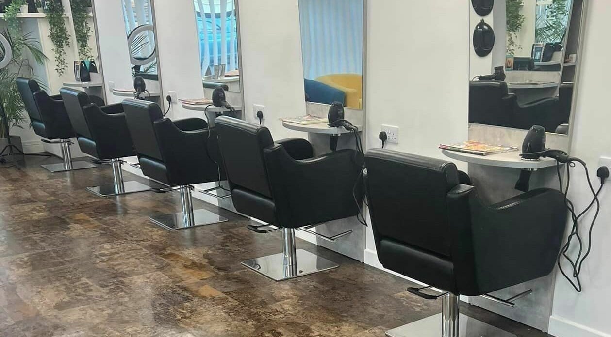 Modern salon chairs at Macie's, Guernsey, Castel, GG providing a sleek and stylish setting for beauty treatments.