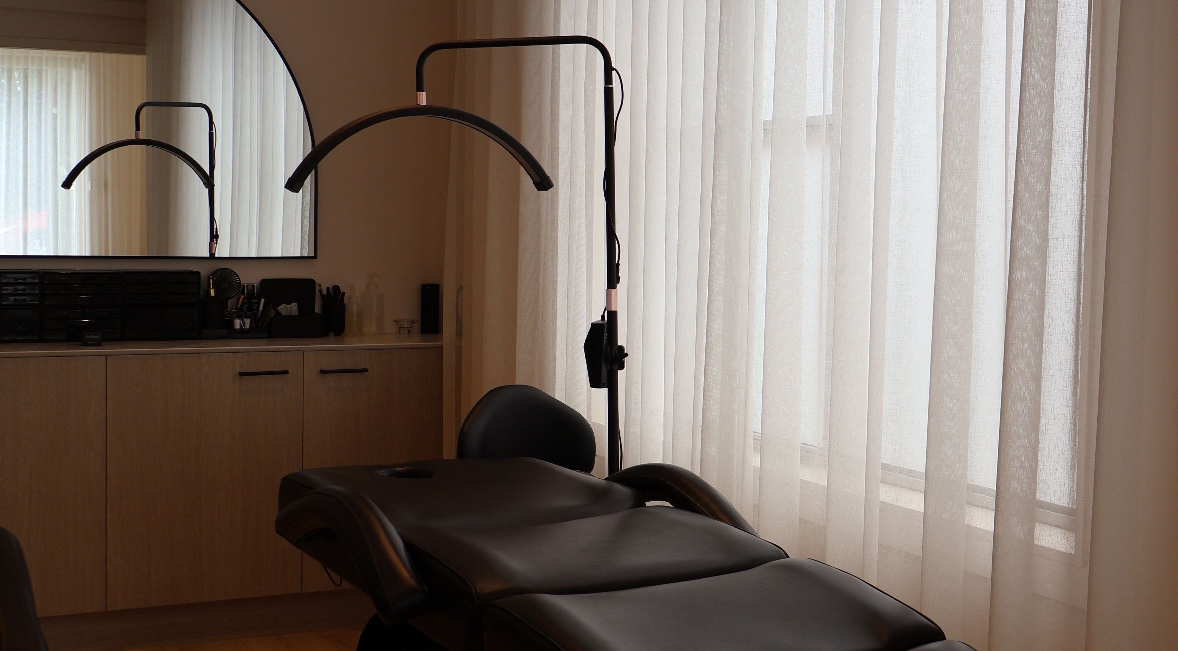 Private treatment room at Lushed Beauty, Wollongong, New South Wales, AU. Featuring modern design and comfortable seating.