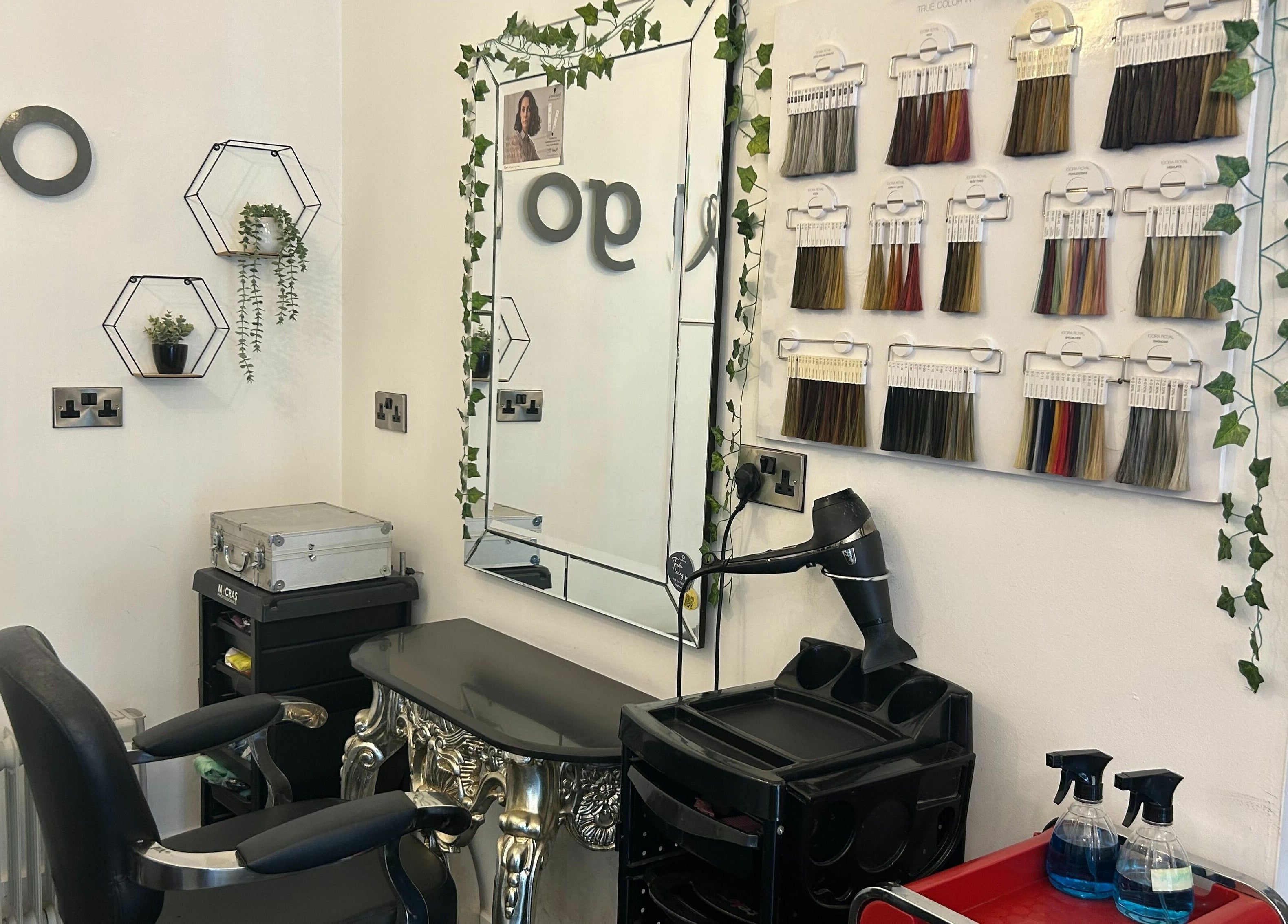 Chic styling station at SY2 The Salon, Shrewsbury, England, GB with hair color samples.
