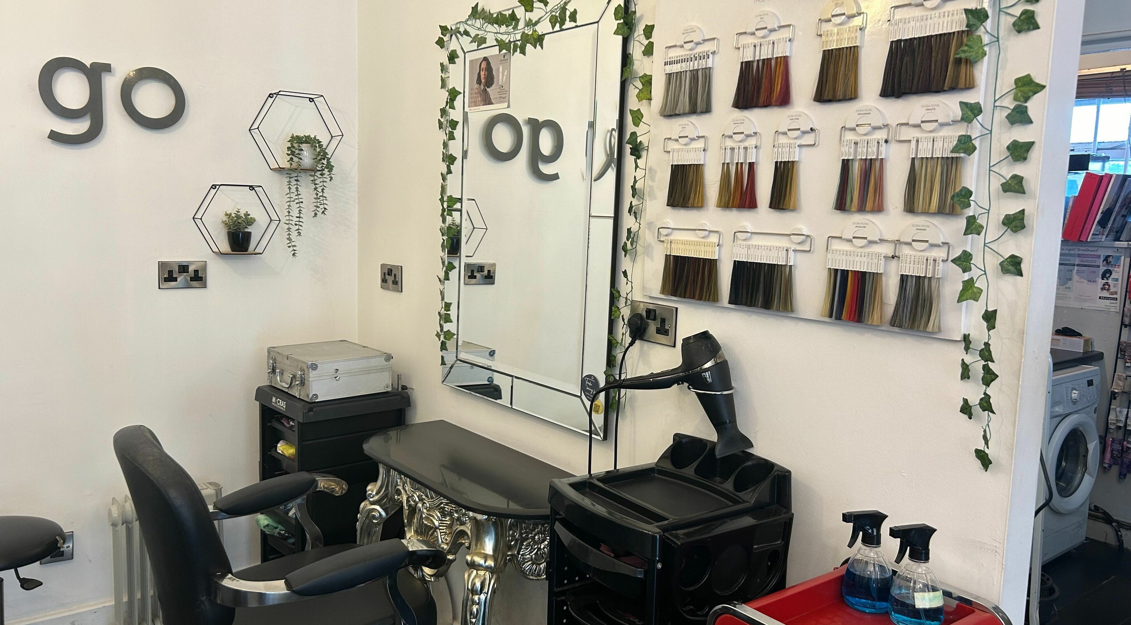 Chic styling station at SY2 The Salon, Shrewsbury, England, GB with hair color samples.