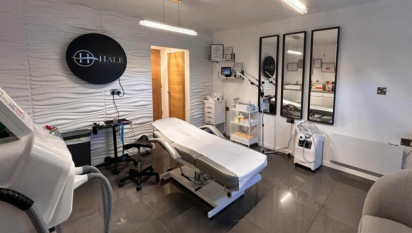 Modern treatment room at Hale Beauty, Sutton Coldfield, England, GB, featuring sleek design and comfortable furnishings.