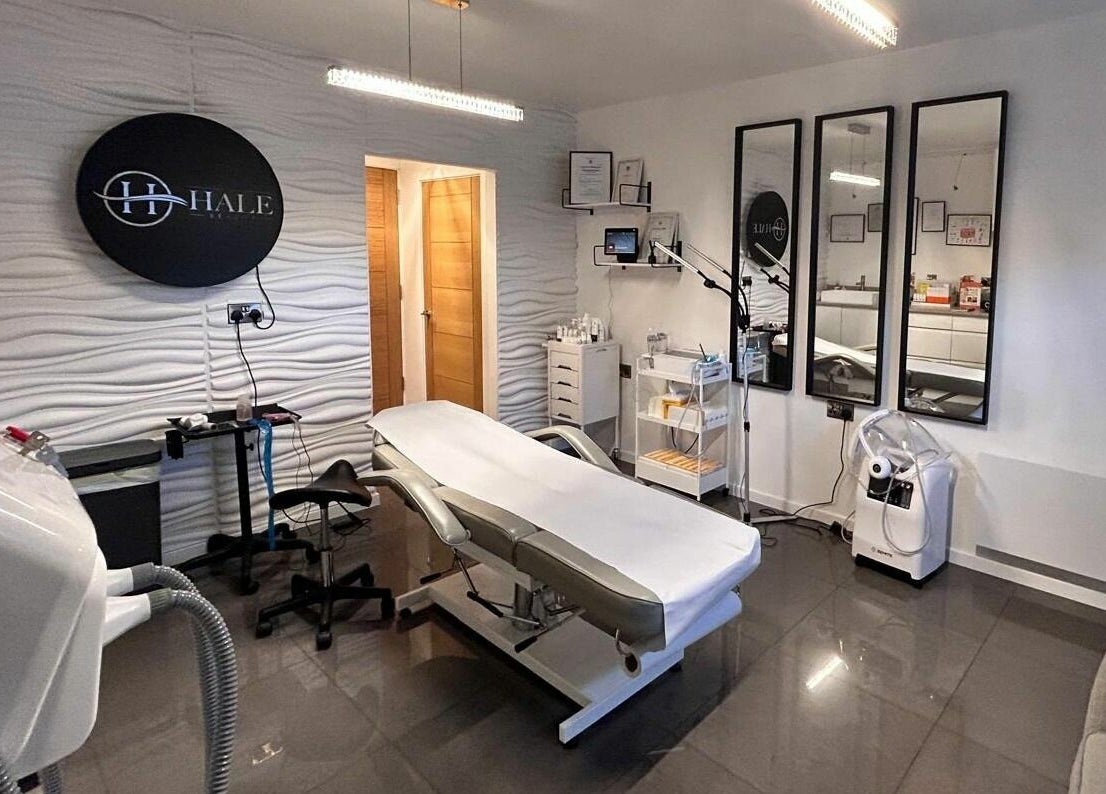 Modern treatment room at Hale Beauty, Sutton Coldfield, England, GB, featuring sleek design and comfortable furnishings.