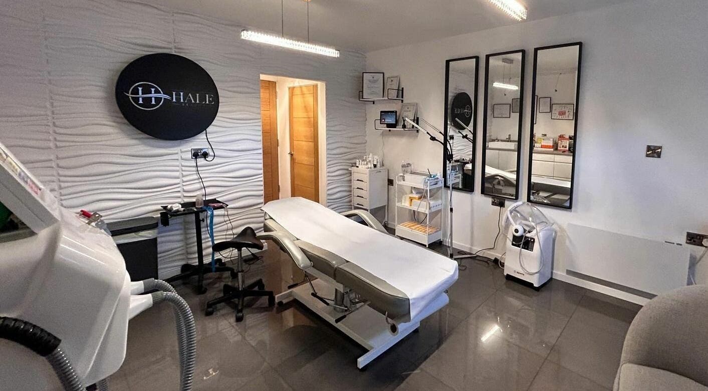Modern treatment room at Hale Beauty, Sutton Coldfield, England, GB, featuring sleek design and comfortable furnishings.