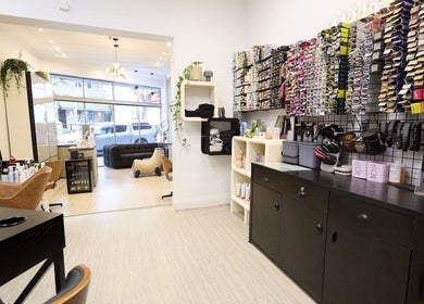 Salon interior at KSHD, Kota Sato Hair Design, in Surry Hills, New South Wales, AU showcasing stylish decor and products.
