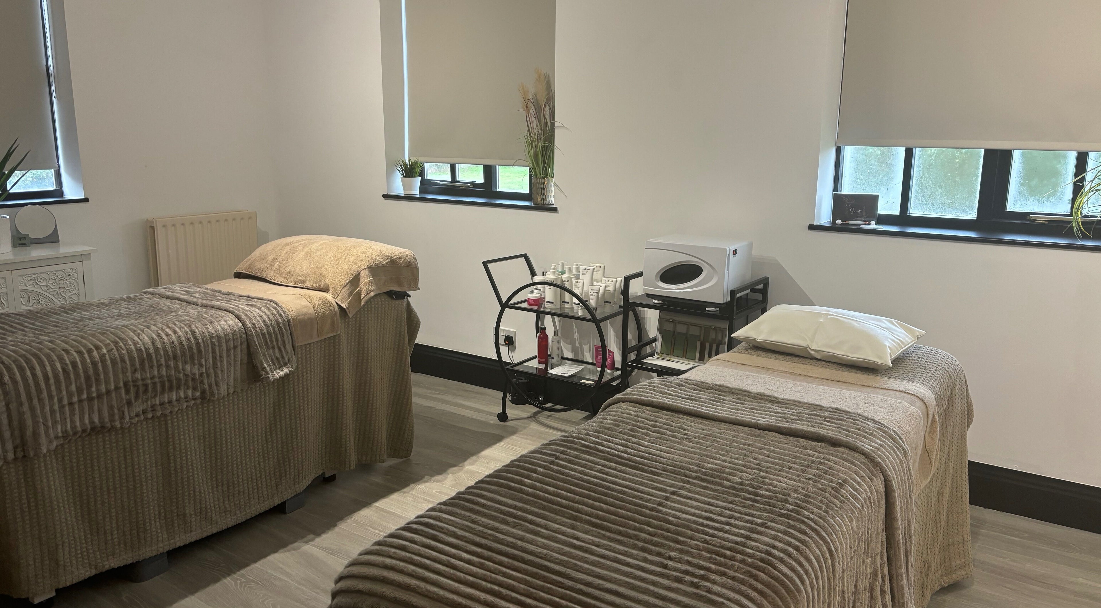Relaxing therapy room at Serene Beauty, Misterton, England, GB, featuring cozy massage beds.