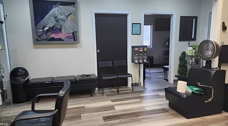 Relaxing seating area at Haven Hair Salon, East Haven, Connecticut, US showcasing sleek, modern decor.
