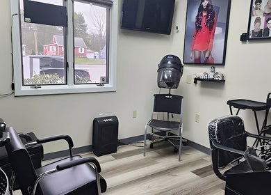 Modern salon chairs and decor inside Haven Hair Salon, East Haven, Connecticut, US.