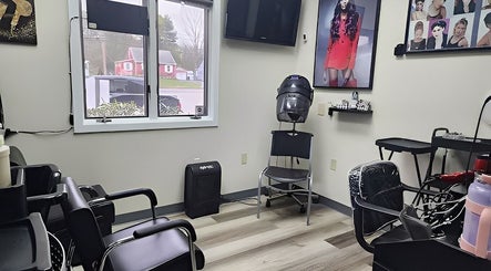 Modern salon chairs and decor inside Haven Hair Salon, East Haven, Connecticut, US.