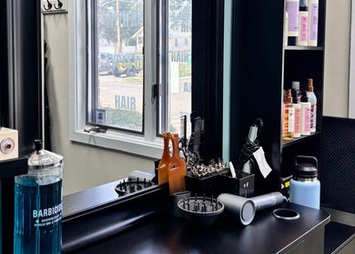 Hair styling tools at Haven Hair Salon in East Haven, Connecticut, US on a stylish workstation.