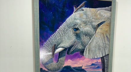 Artwork of an elephant with birds on its back at Haven Hair Salon, East Haven, Connecticut, US.