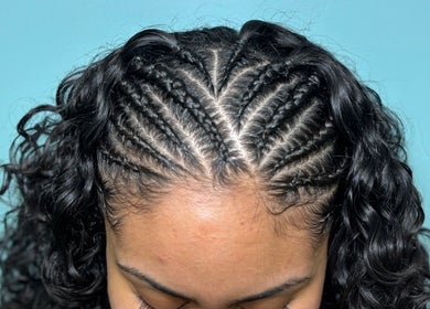 Intricate cornrow braids with curls at Haven Hair Salon, East Haven, Connecticut, US.
