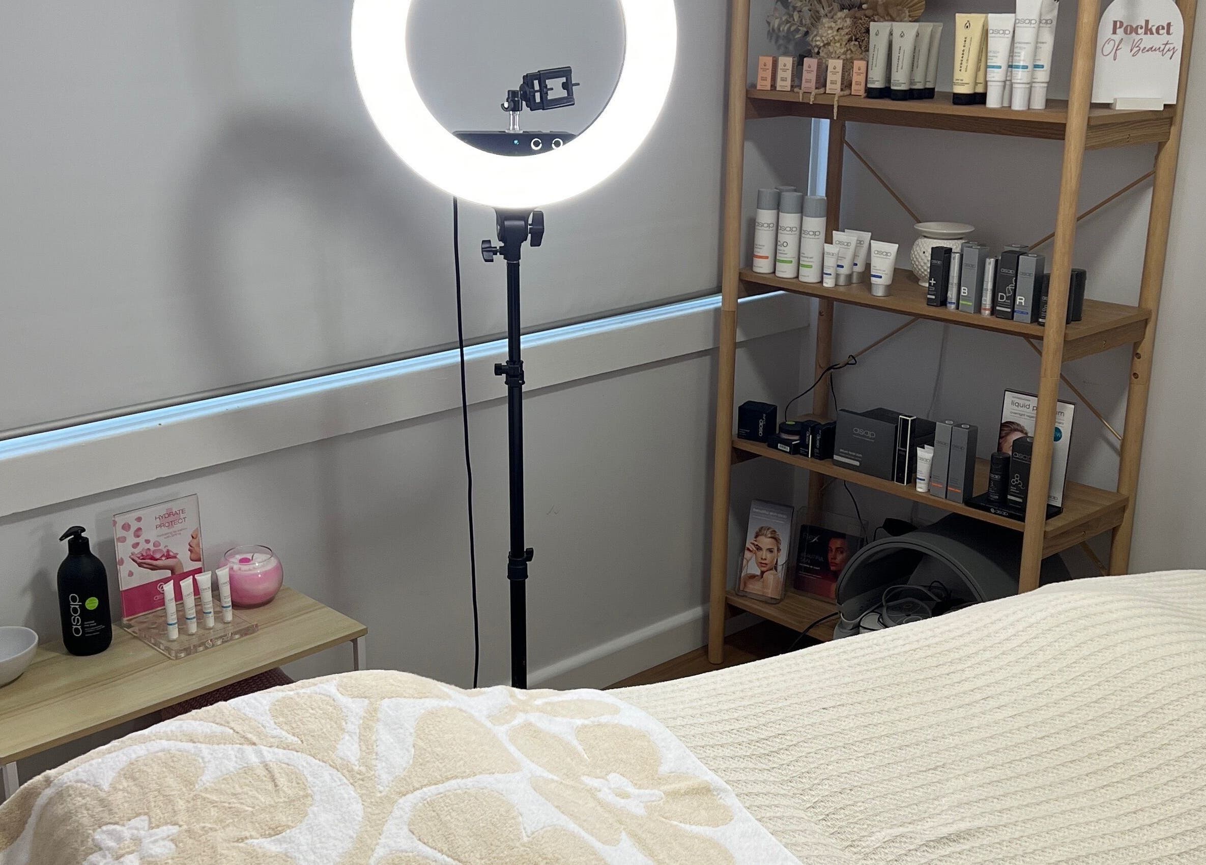 Cozy room at Pocket Of Beauty, West Wallsend, NSW, featuring skincare products and a gentle, relaxing ambiance.