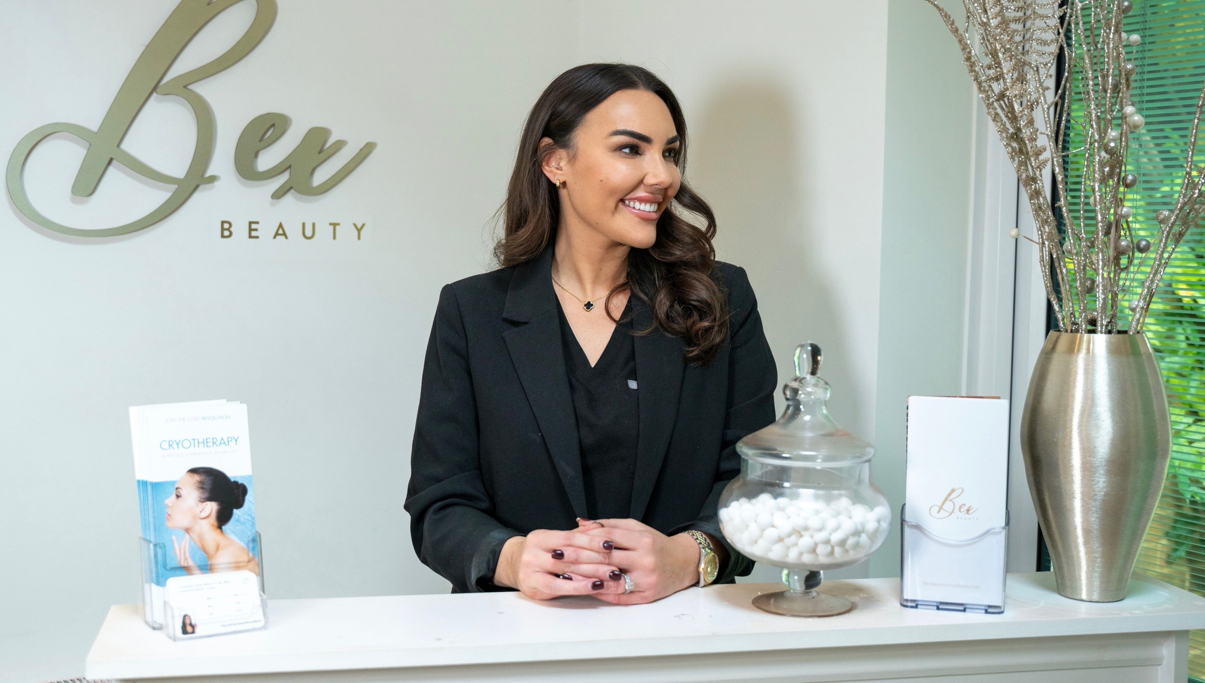 Receptionist smiling at Beauty + Skin with Bex in Great Bookham, England, GB.