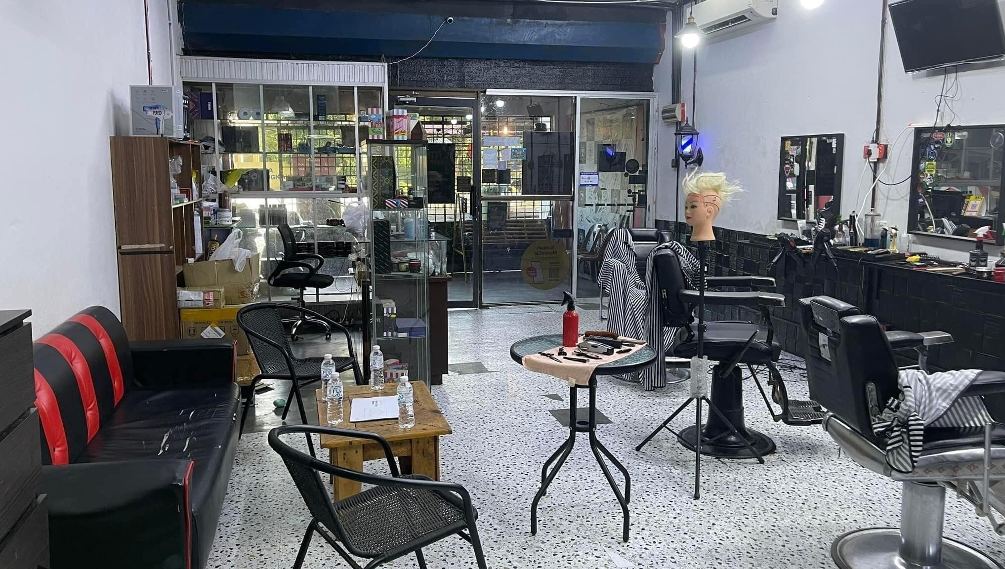 MTB Barbershop and Academy interior in Langkawi, Kedah, MY featuring modern barber chairs and mirrors.