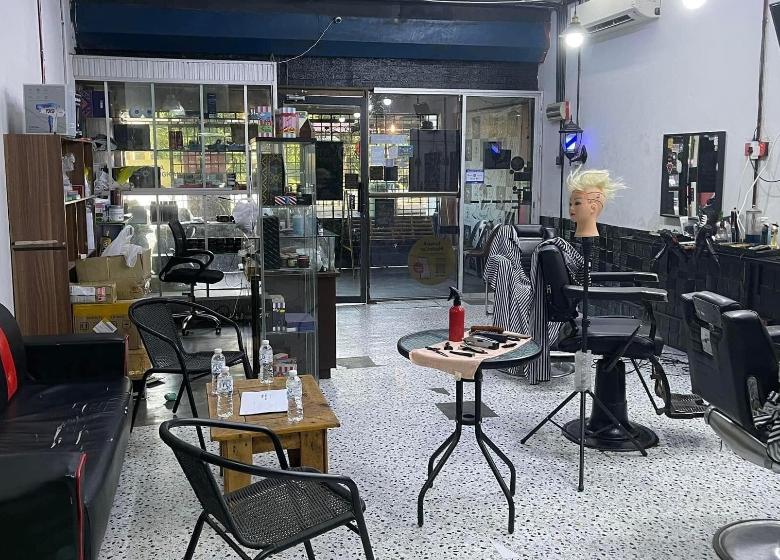 MTB Barbershop and Academy interior in Langkawi, Kedah, MY featuring modern barber chairs and mirrors.