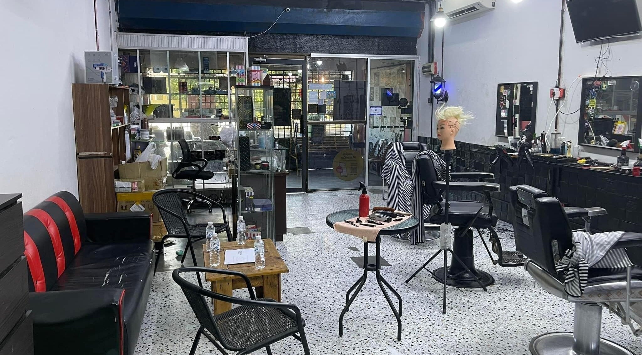 MTB Barbershop and Academy interior in Langkawi, Kedah, MY featuring modern barber chairs and mirrors.