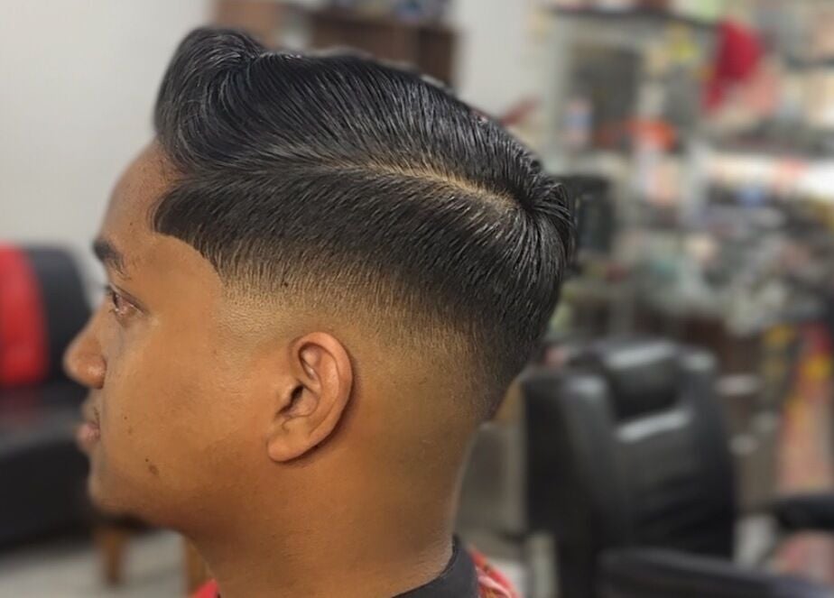 Close-up of a sharp fade haircut at MTB Barbershop and Academy, Langkawi, Kedah, MY.