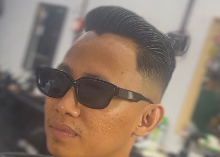 Trendy haircut at MTB Barbershop and Academy in Langkawi, Kedah, MY, showcasing expert style.