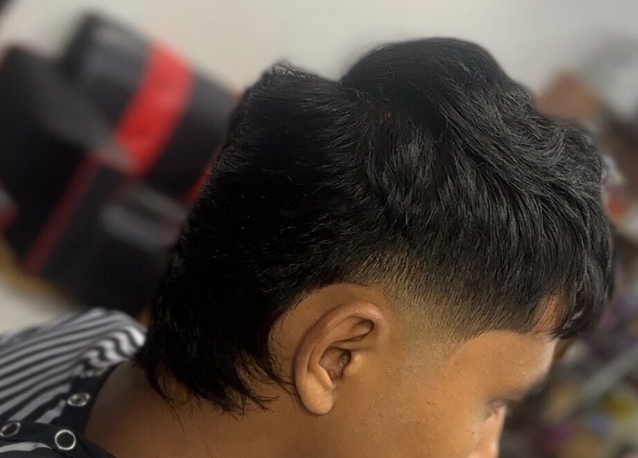 Trendy mullet haircut showcased at MTB Barbershop and Academy in Langkawi, Kedah, MY.