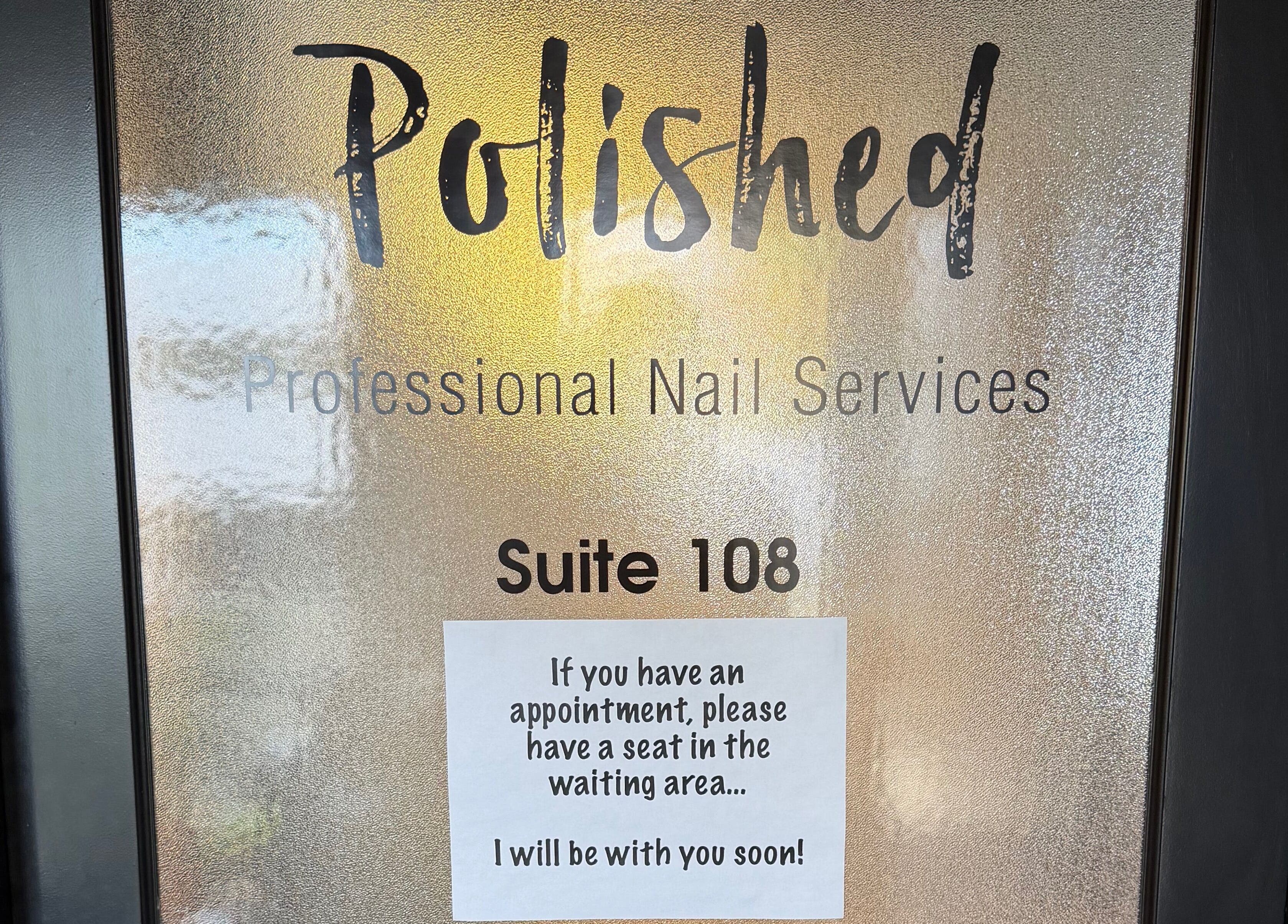 Entrance to Polished Nail Services, Suite 108 in Valparaiso, Indiana, US with appointment sign.
