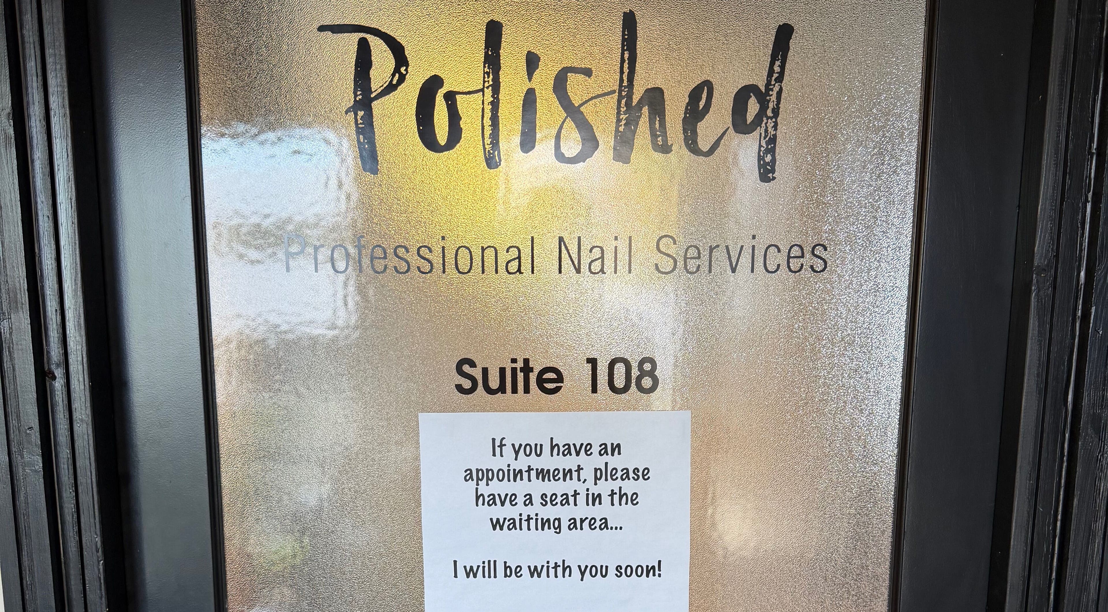 Entrance to Polished Nail Services, Suite 108 in Valparaiso, Indiana, US with appointment sign.