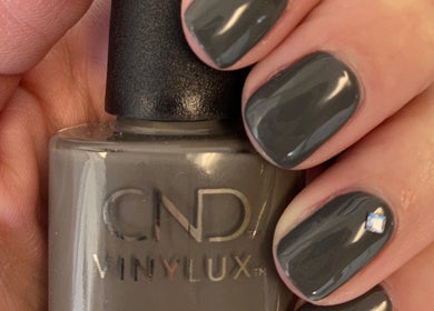 Stylish grey manicure with a gem detail at Polished, Valparaiso, Indiana, US.